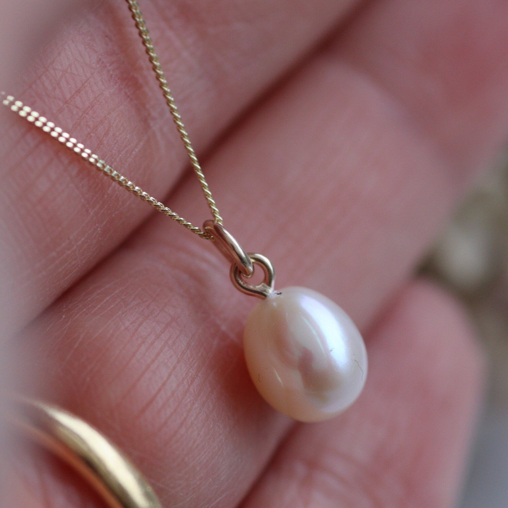 diamond cut curb chain with large pearl drop and handmade gold minimalist classic bail. 