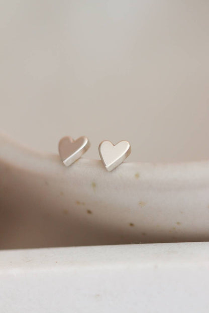 Tiny Hand-Pierced Silver Heart Studs